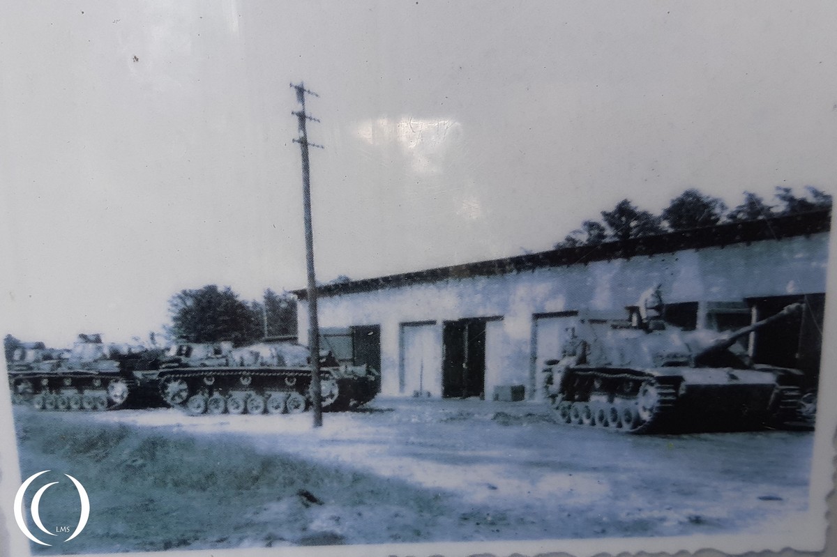 German Panzers in front of a workshop in Oksbol - photo from a info board at the camp