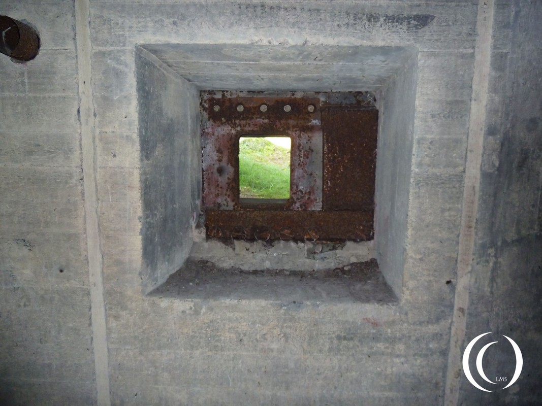 Close quarter defense seen from the inside of the 610 command and personnel bunker