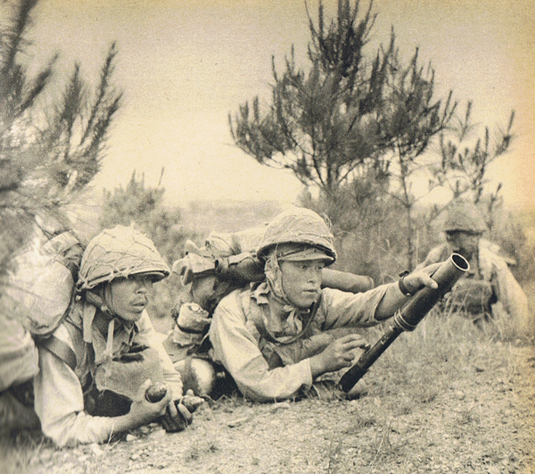 Japanese Soldiers during the Zhejiang Campaign in 1942 using the Type 89 Grenade Dispencer - Courtsey Wikipedia